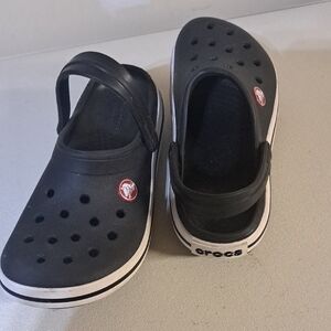 CROCS Kids Black Slip-On Clogs with White Trim and Red Logo